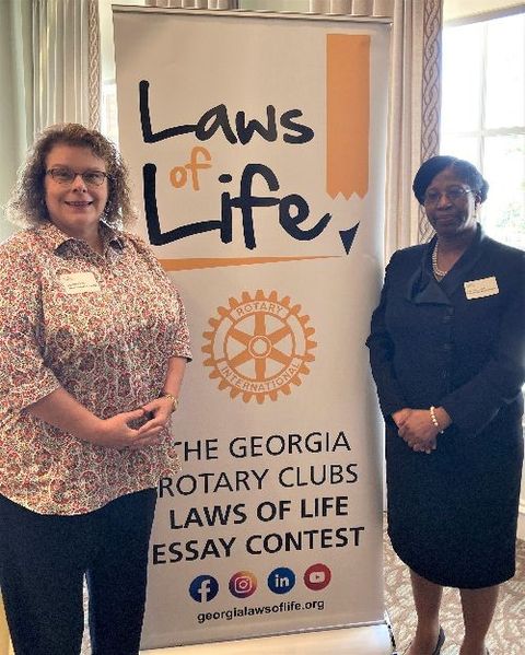 Rotarian Cynthia Kilby and Teacher Patricia Childs attend Laws of Life event.jpg