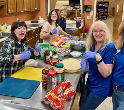 Shilki Sisters, Susan Zeigler, and Lisa Thompson making pizzas.jpg