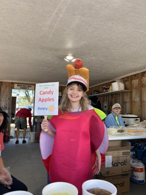 Interact student selling Candy apples.jpg