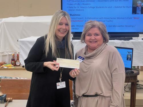 Angie Shirah accepts a check for $500 from the Rotary club to help support the Ferst Readers Program 25.jpg