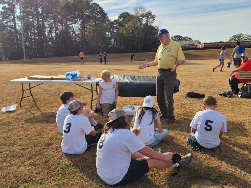Bob Patterson talking to Jessie's team rotary 4 way test.jpg