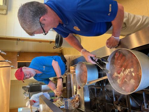 Bob Patterson and Al Griffin- Cooking Hot Dogs -  Rotarians in Action.jpg